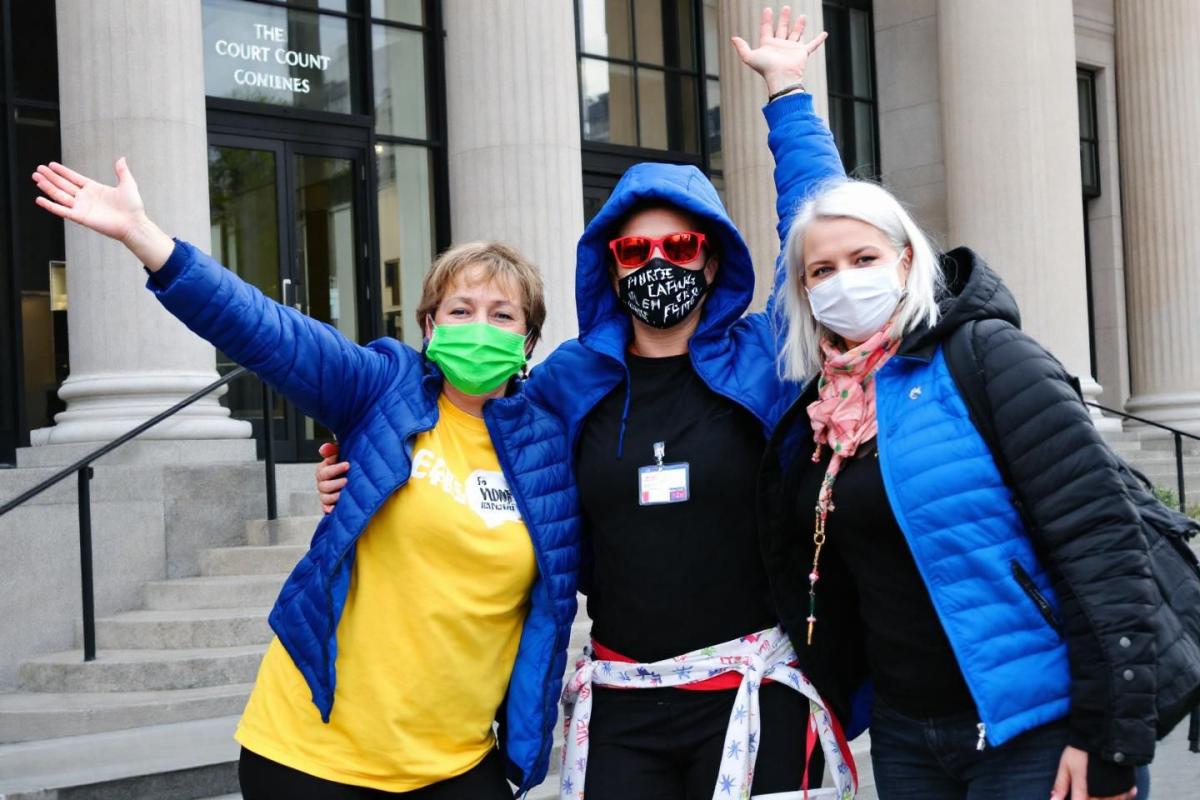 Three UK activists cleared over Stonehenge orange powder protest charges